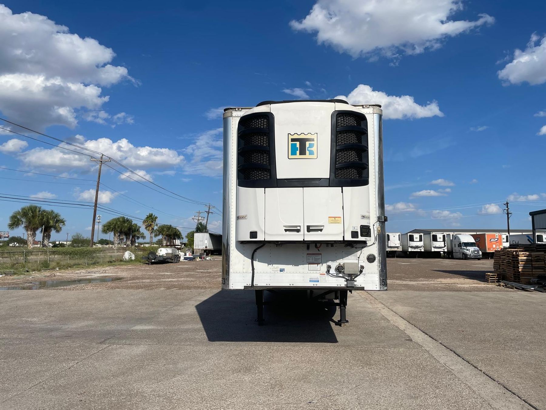 Reefer trailer with a row of trailers behind